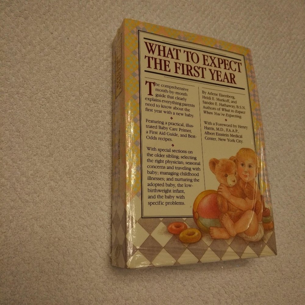 NEW "WHAT TO EXPECT THE FIRST YEAR" PAPERBACK BOOK